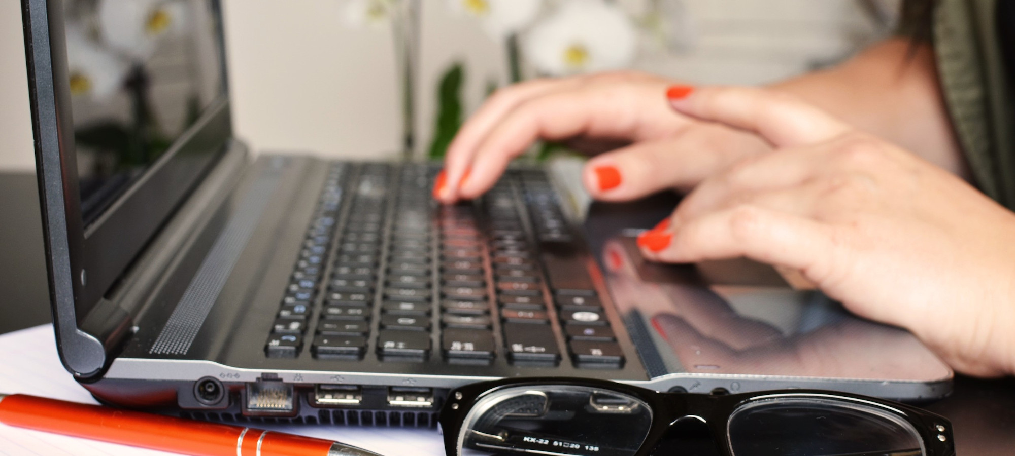 A close-up of someone's computer keyboard as they type